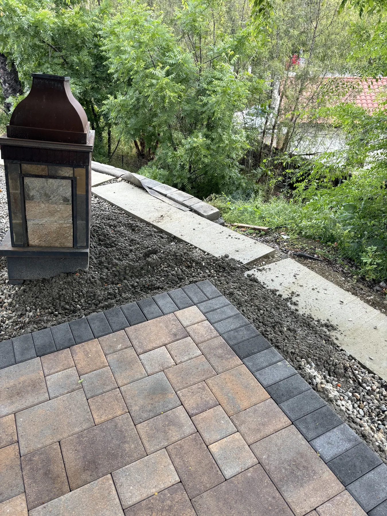 Paver pathway through a planted bed