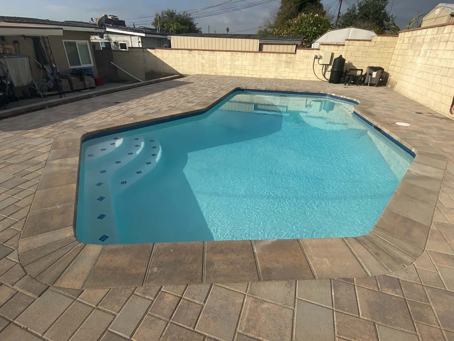 Pool with new coping and paver deck