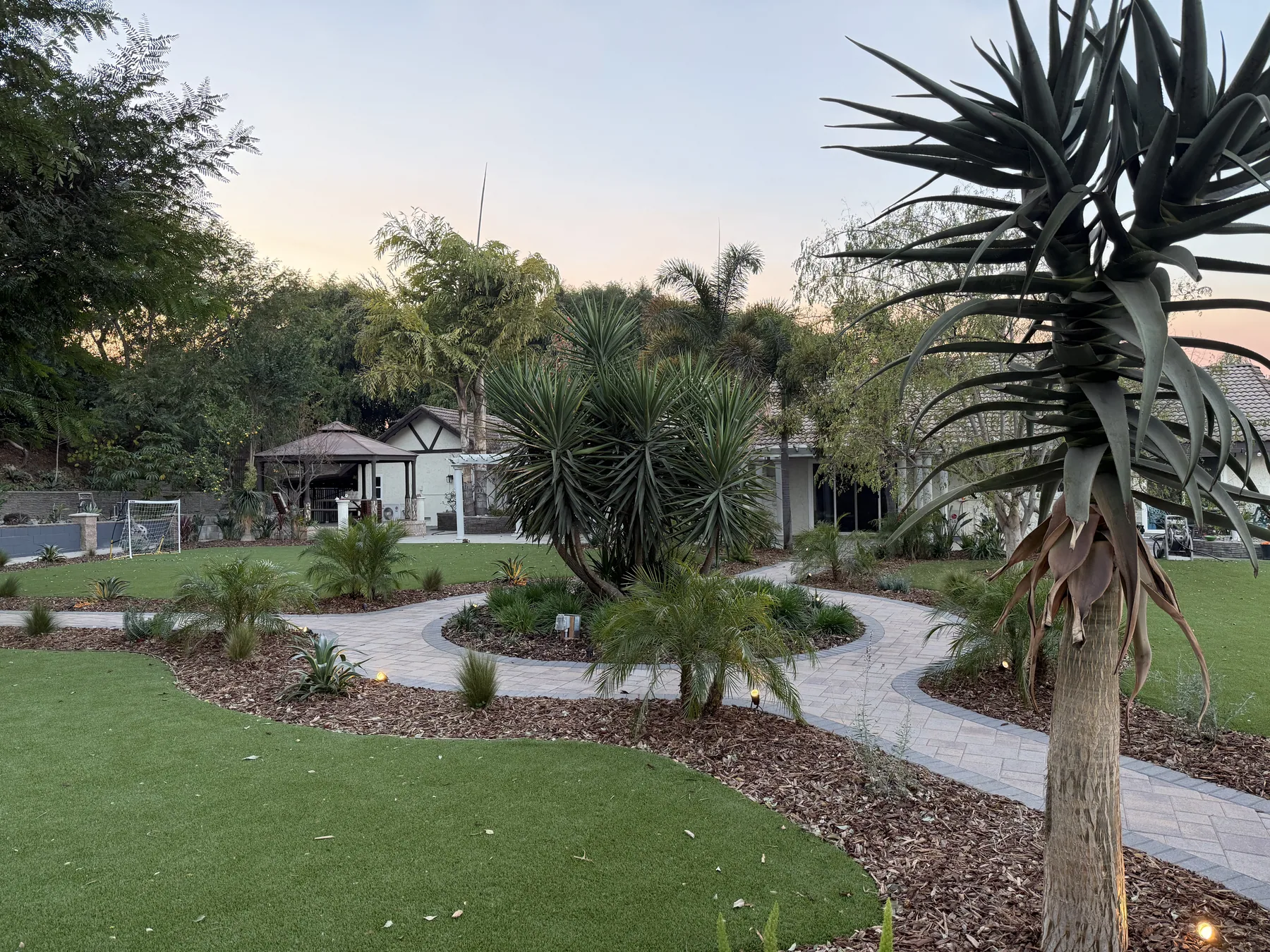 Turf lawn with clean edge against pavers