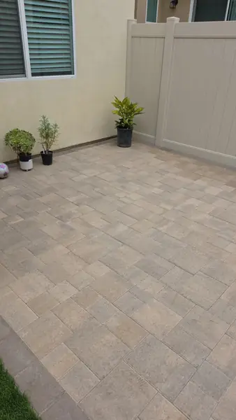 Paver patio corner with planters