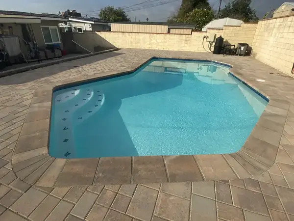 Pool with new coping and paver deck