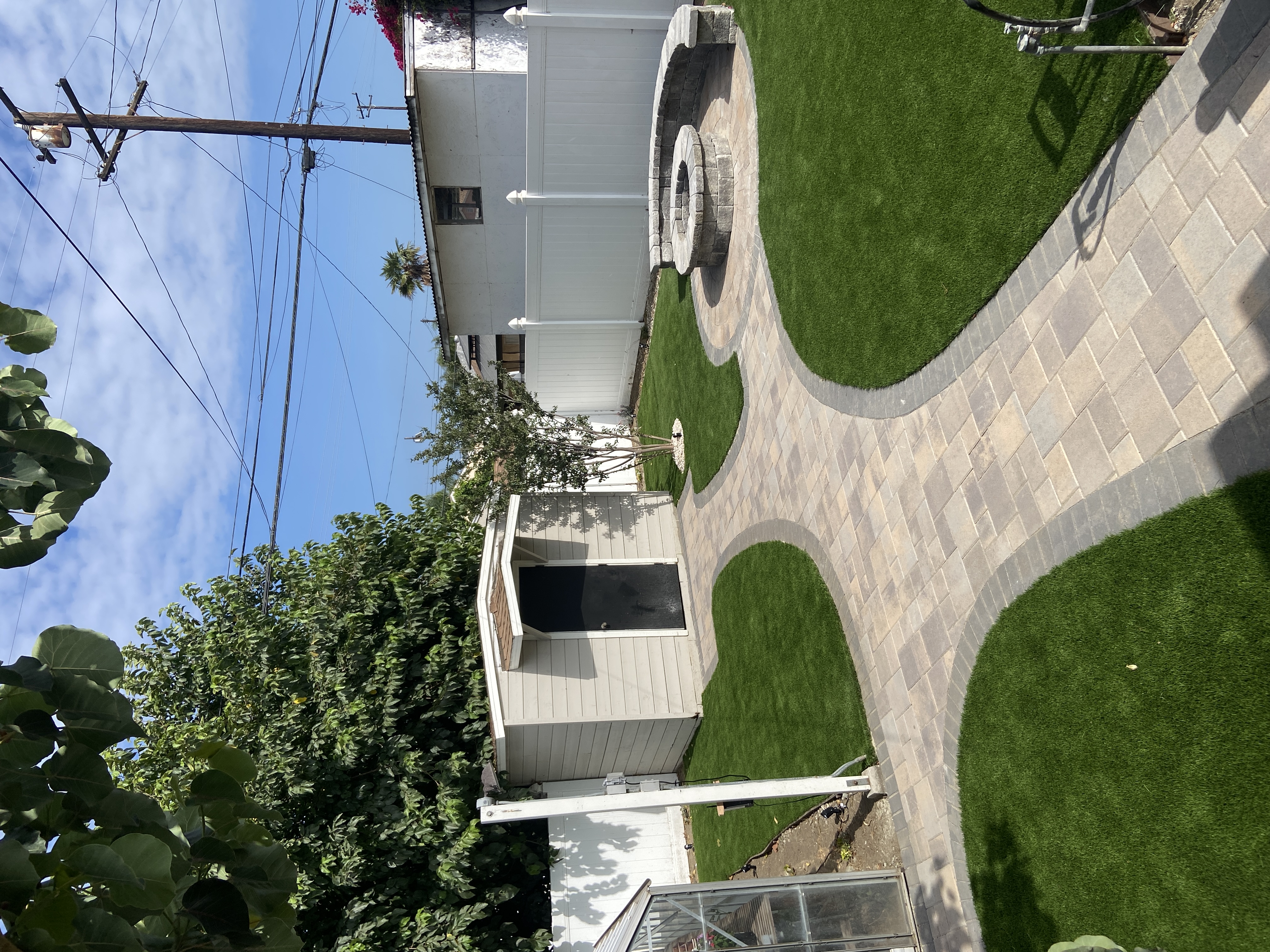 Turf and paver combo with fire pit area